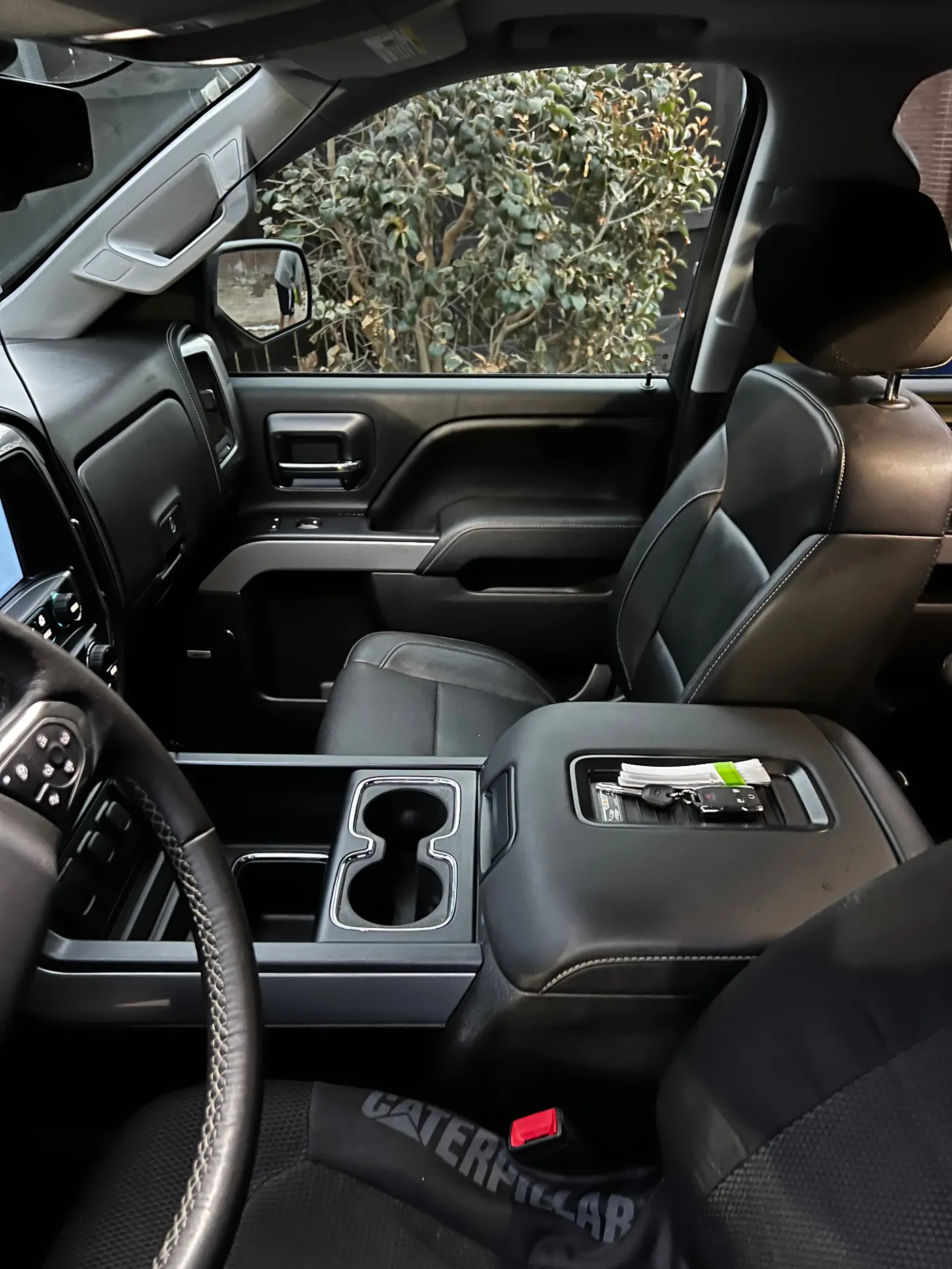 Finished interior of the Chevrolet Silverado with clean seats and console