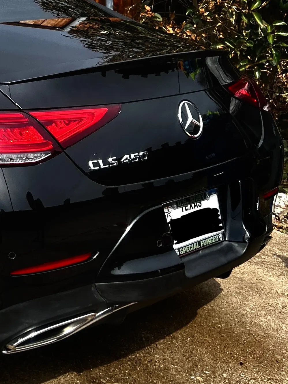 Mercedes-Benz CLS 450 rear quarter with polished dual exhaust