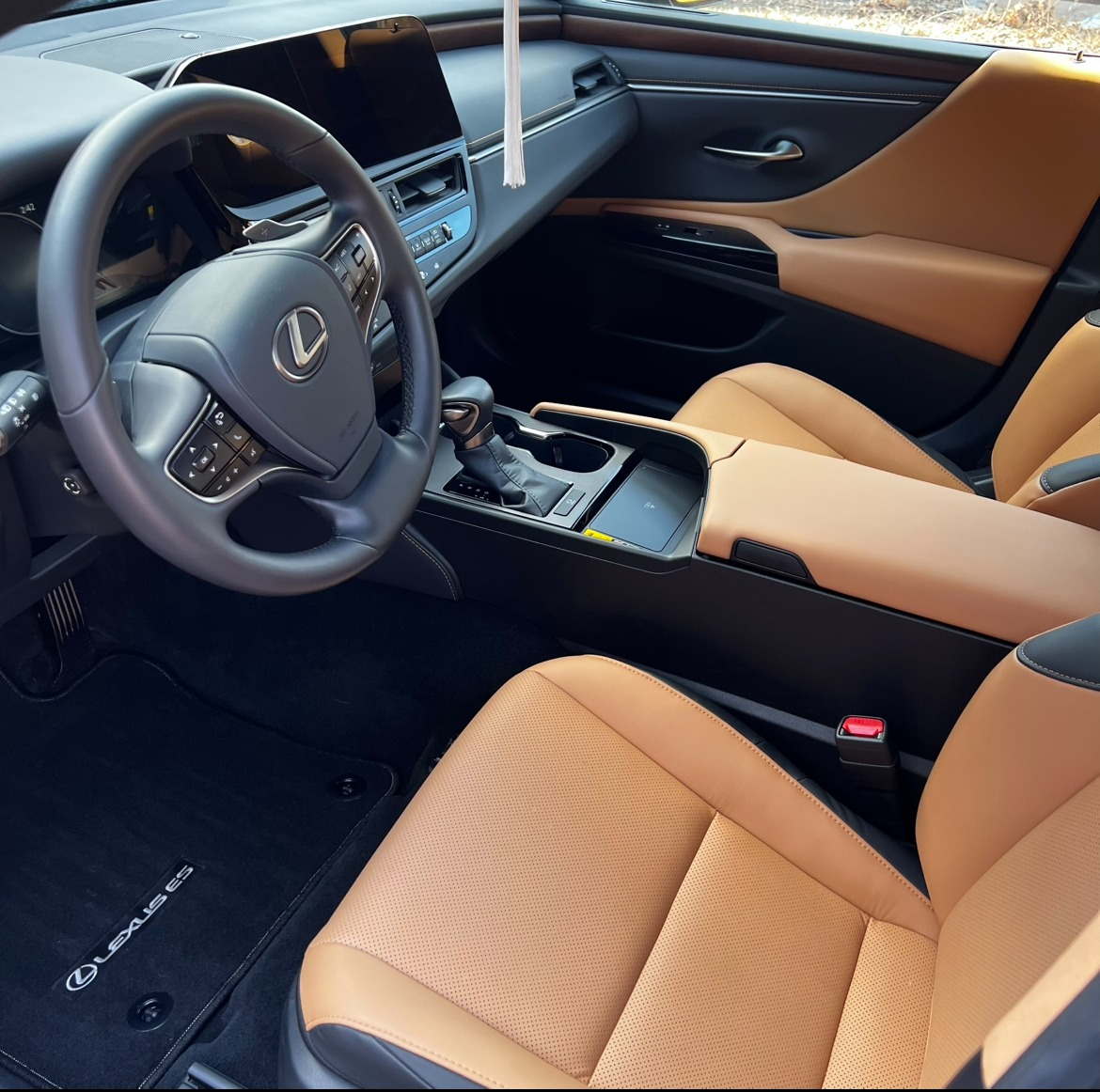 Clean tan leather interior of the Lexus ES after detailing