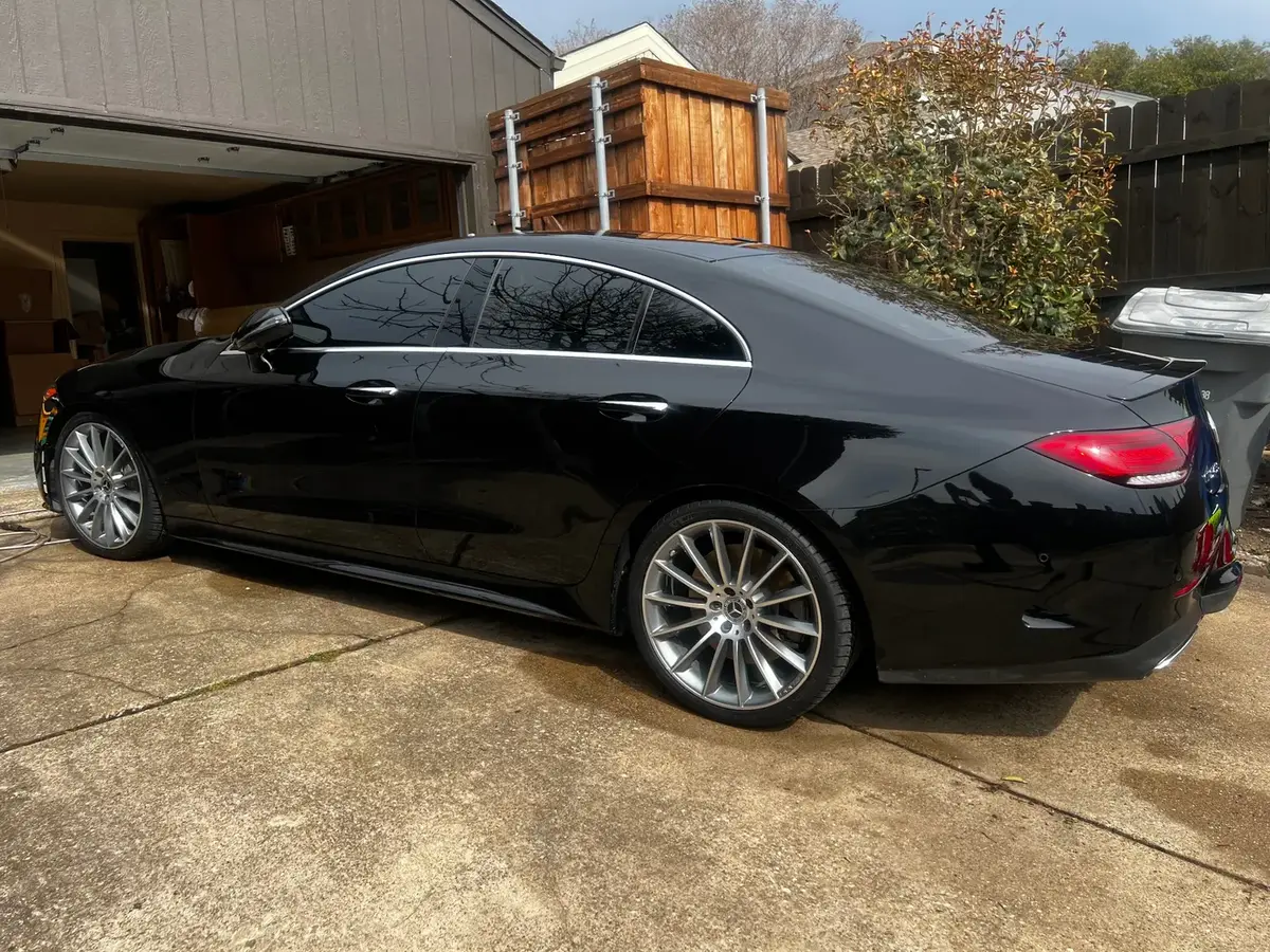 Mercedes-Benz CLS 450 side profile with mirror-gloss black finish