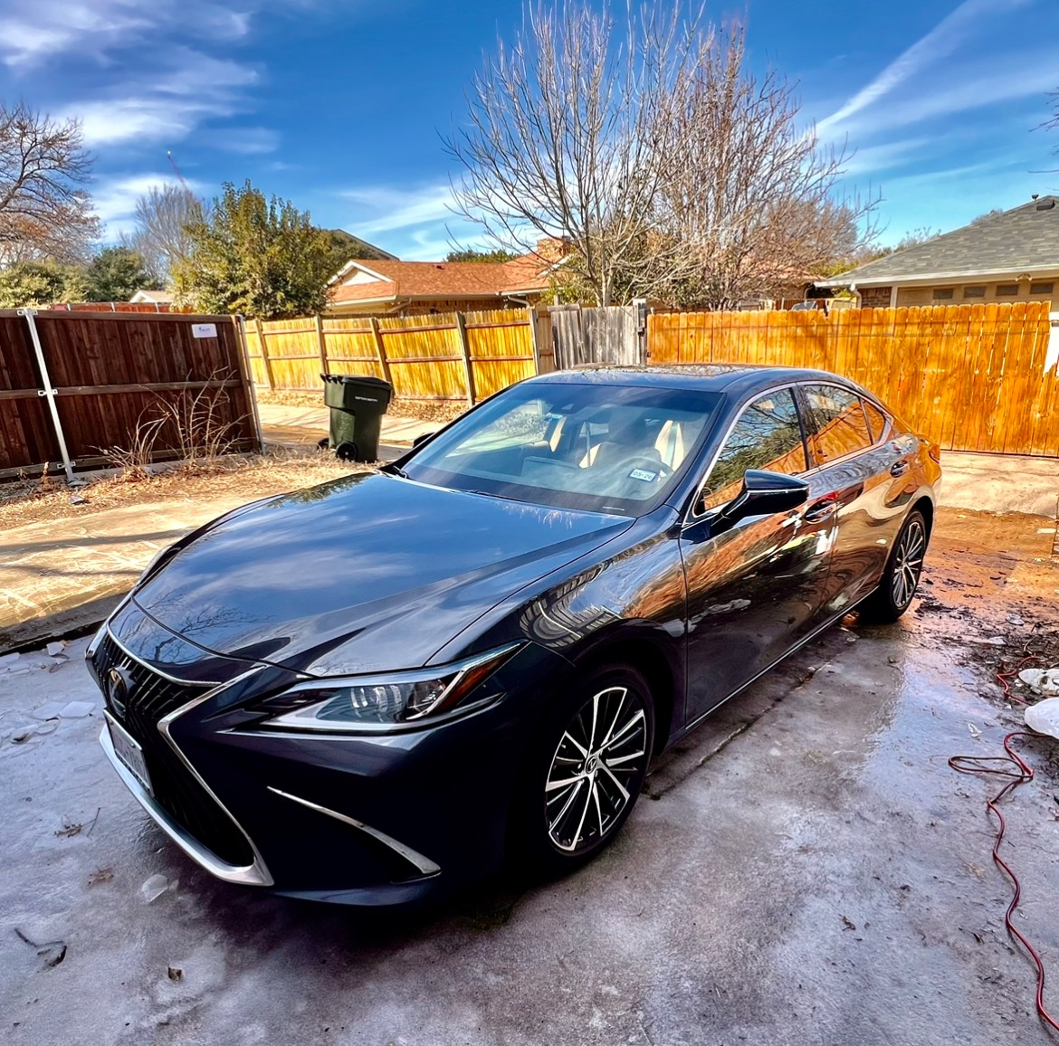 Finished dark grey Lexus ES with a deep gloss after paint correction in Plano, TX
