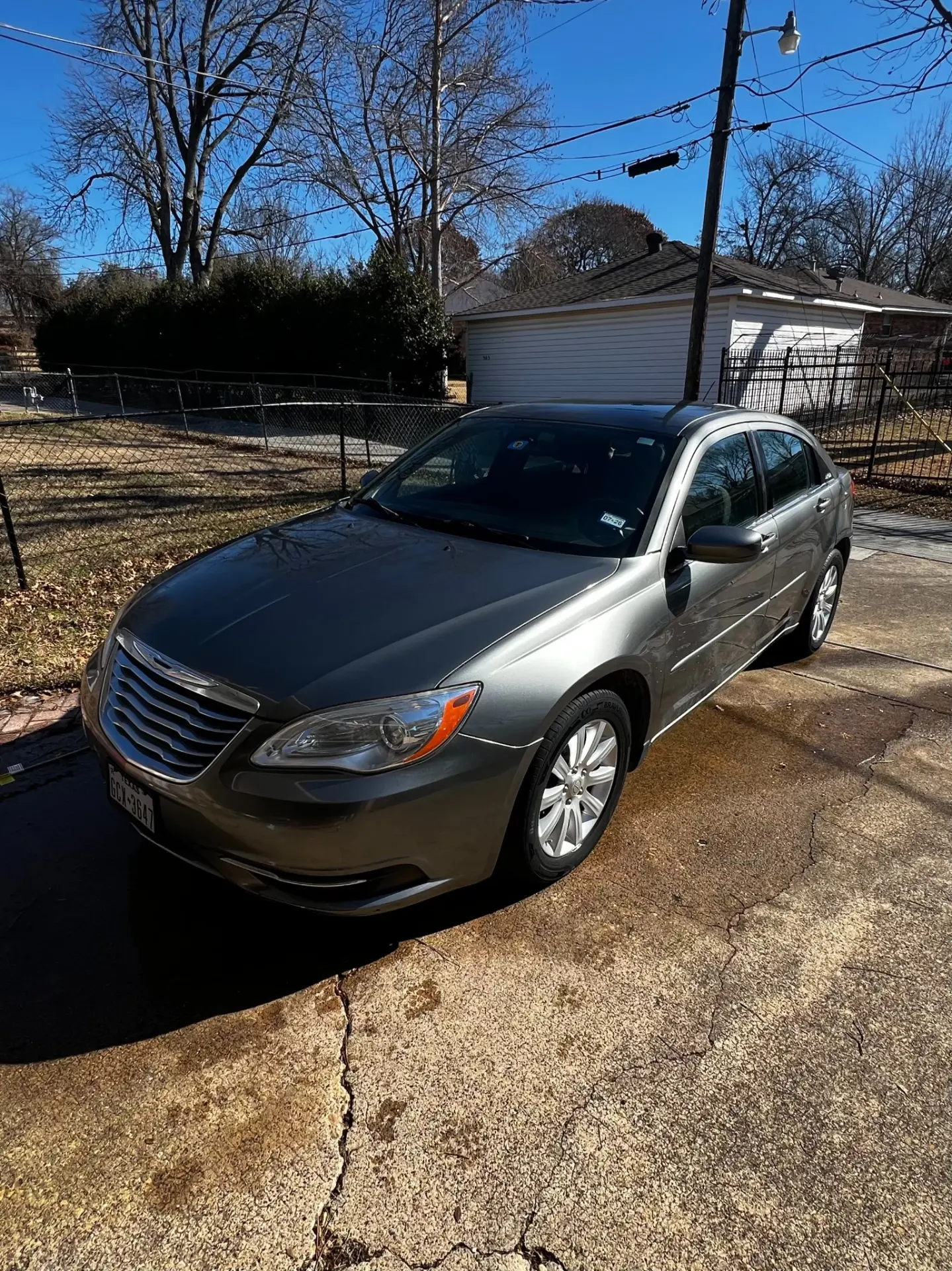 Finished grey Chrysler 200 exterior after the custom detail in Plano, TX